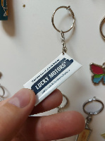 Брелок из полимерной смолы, двухсторонний на пластике, размер 2.5х5см